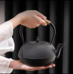 cast iron tea pot with infuser