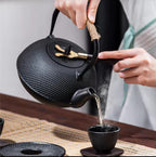 cast iron tea pot with infuser