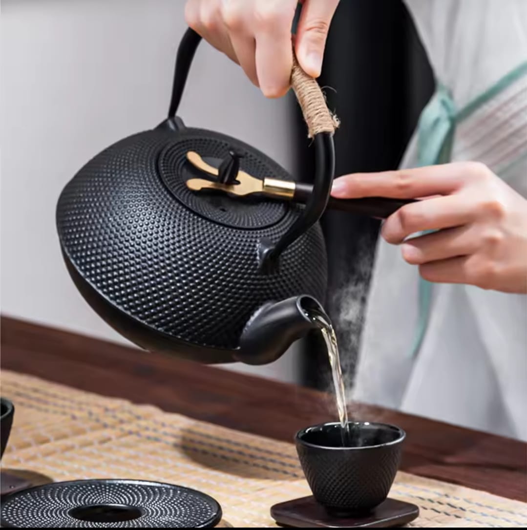 cast iron tea pot with infuser
